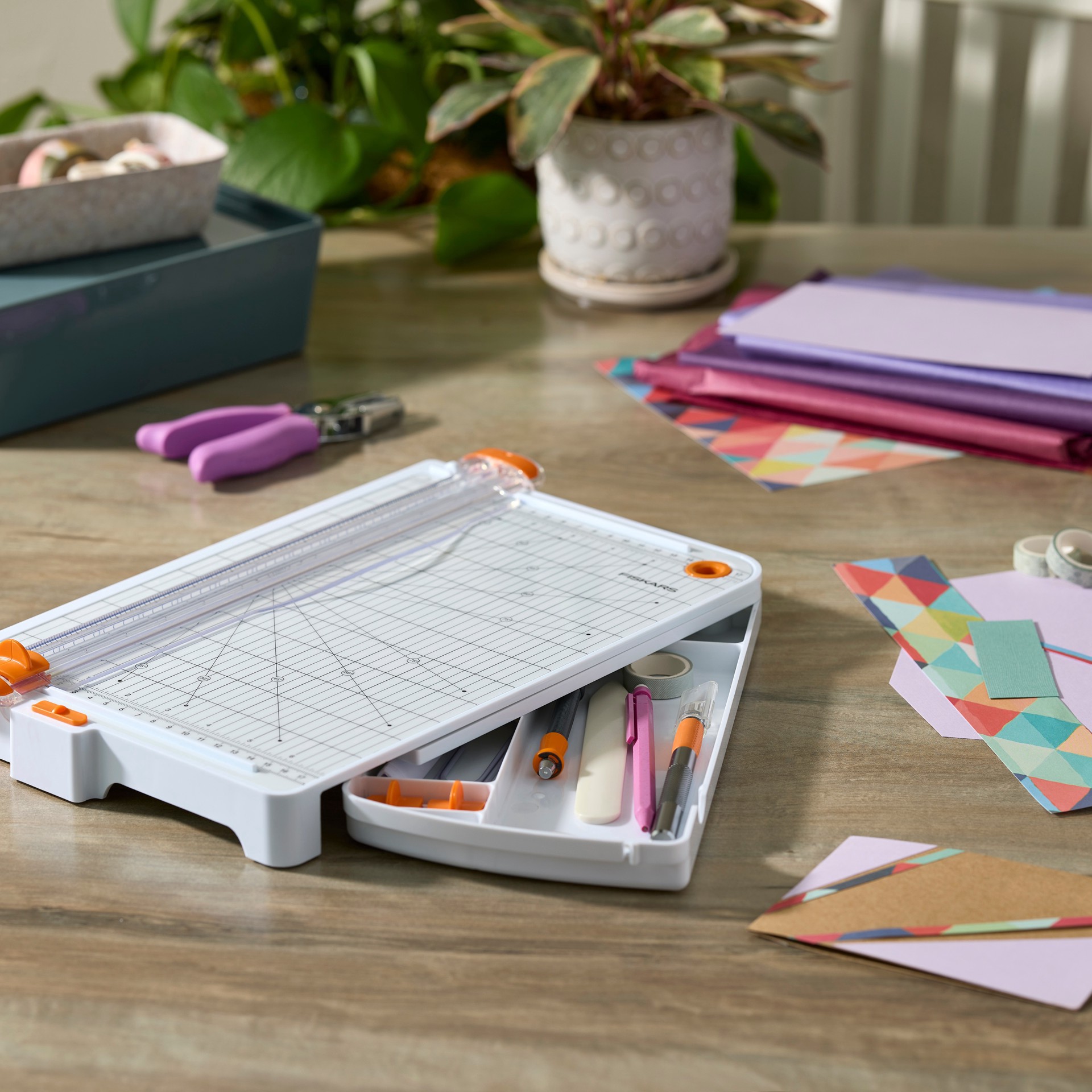 slide 5 of 8, Fiskars Surecut Deluxe Trimmer With Built-In Storage, 1/16 in