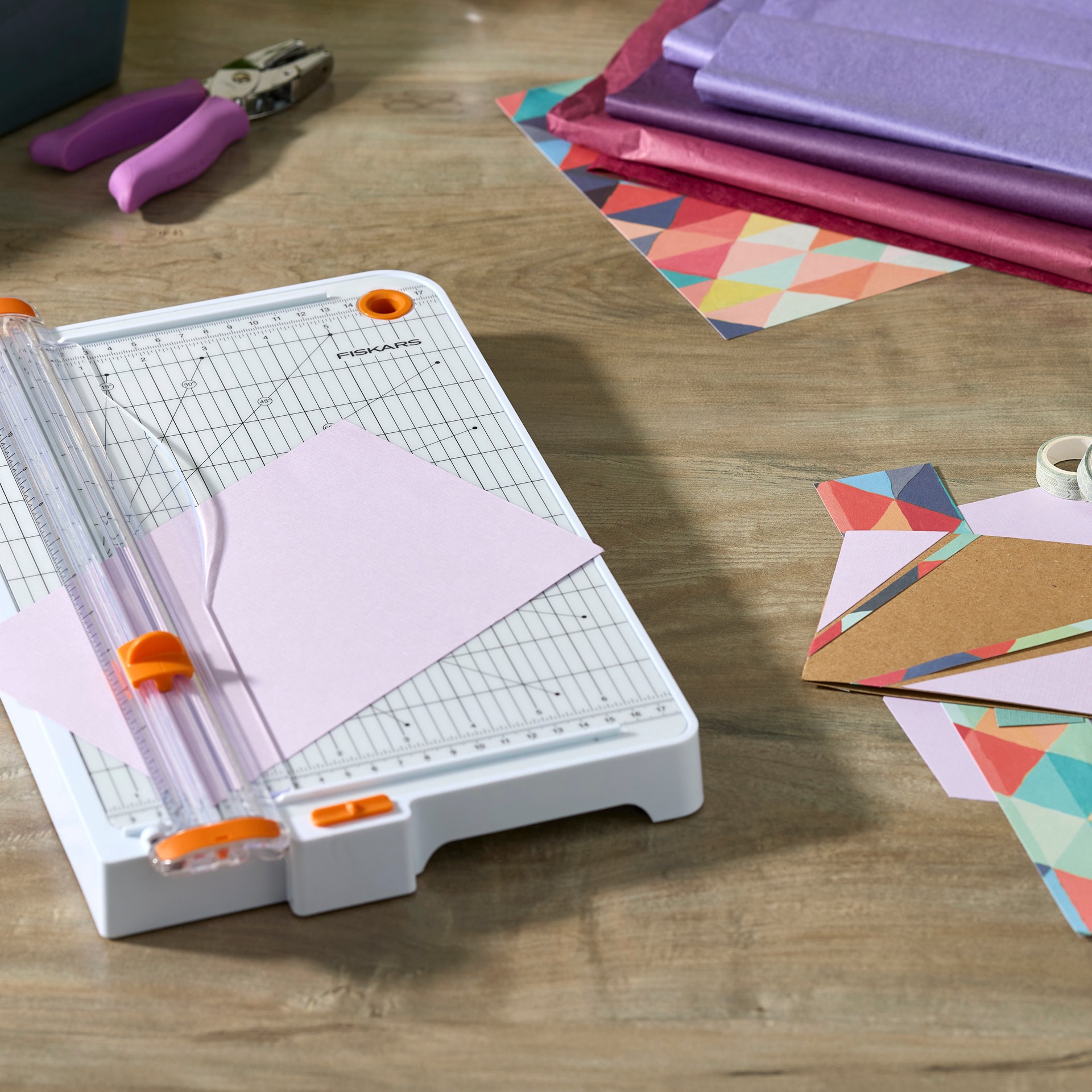 slide 4 of 8, Fiskars Surecut Deluxe Trimmer With Built-In Storage, 1/16 in