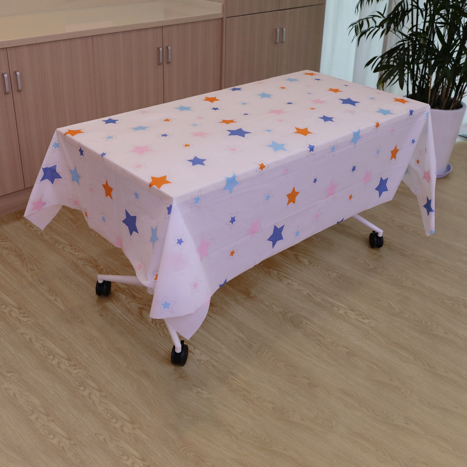 slide 3 of 3, 54" X 108" Multicolor Stars Plastic Table Cover By Celebrate It, 54 in x 108 in