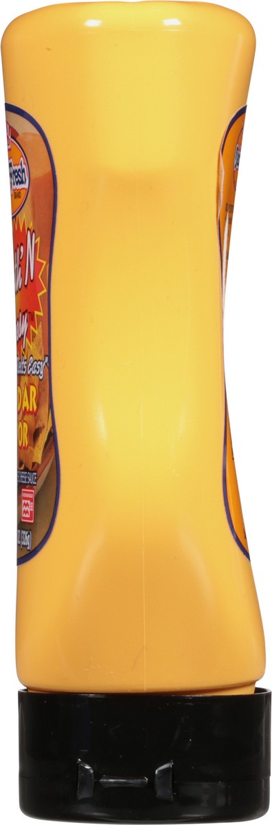 slide 4 of 9, Dairy Fresh Cheesy Cheddar In Squeeze Bottle, 11.5 oz