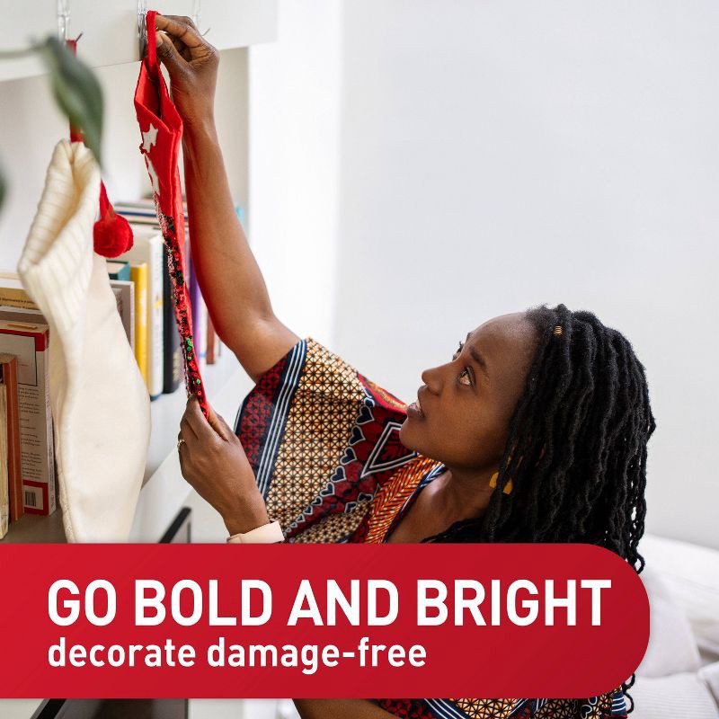 slide 3 of 11, Command 6pk Damage-Free Hanging Clear Medium Wire Toggle Hooks with Adhesive Strips for Christmas Lights and Holiday Decorations, 6 ct