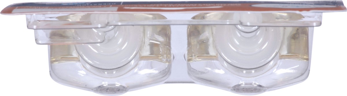 slide 2 of 13, Glade PlugIns Scented Oil 2 Refills, Air Freshener, Vanilla Caramel Twist, 2 x 0.67 oz, 1.34 fl oz