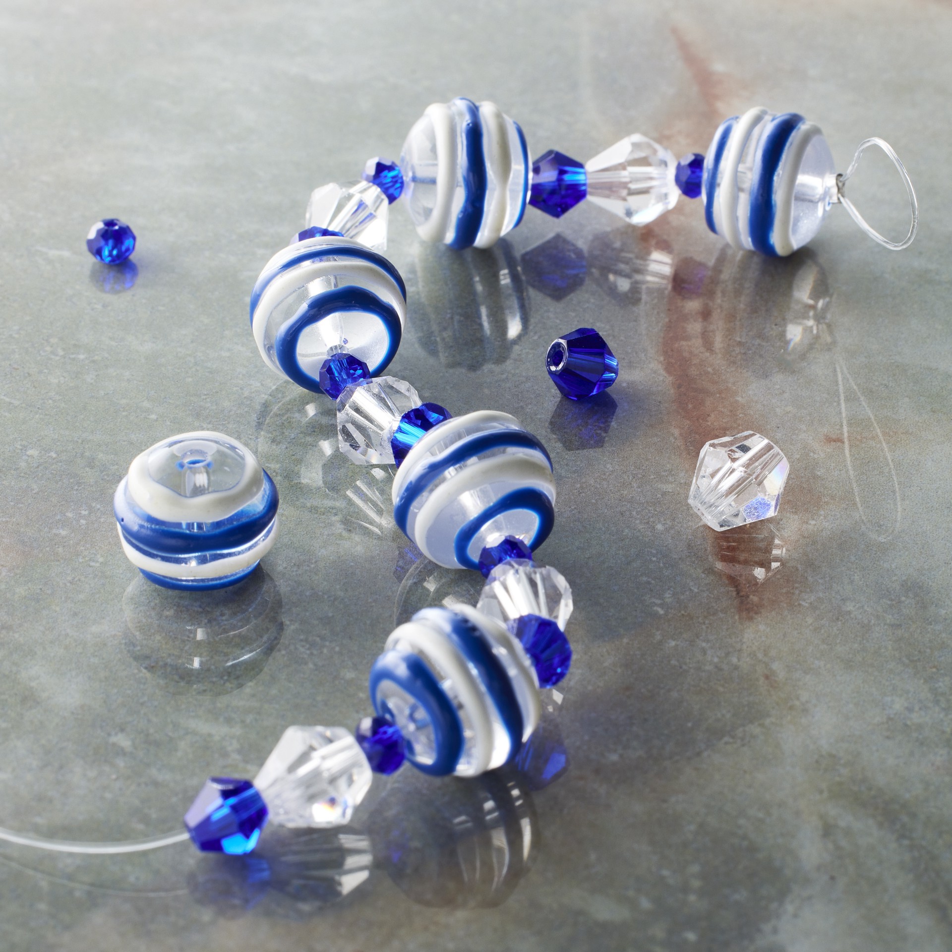 slide 2 of 3, Blue & White Stripe Lampwork Glass Round Bead Mix By Bead Landing, 10.5mm x 12.5mm