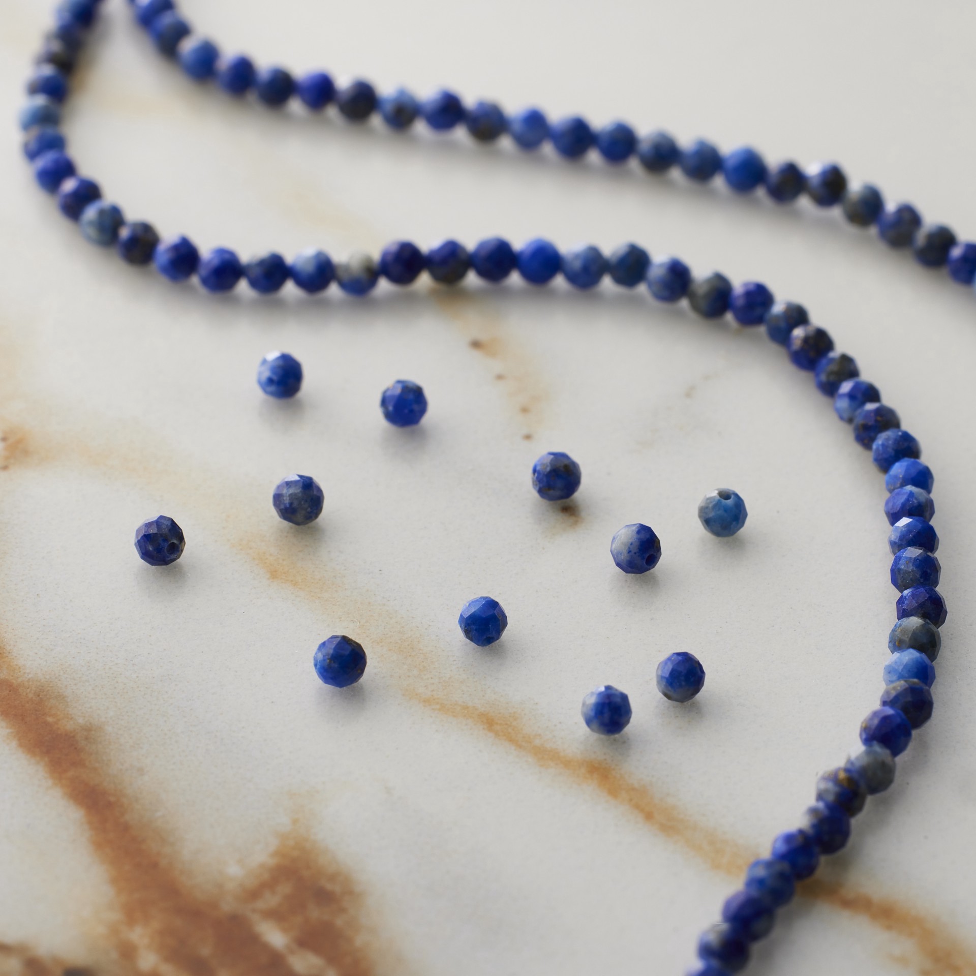 slide 3 of 3, Dyed Lapis Faceted Round Beads, 2mm By Bead Landing, 2mm