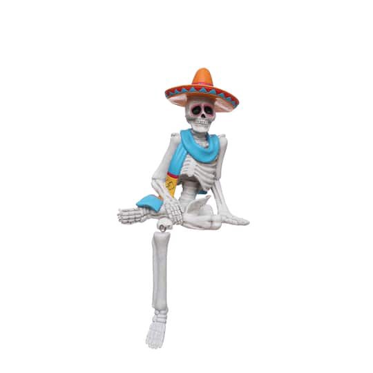 slide 1 of 3, 9" Day Of The Dead Sitting Skeleton With Sombrero Tabletop Decor By Ashland, 4.38 in x 3.5 in x 9 in