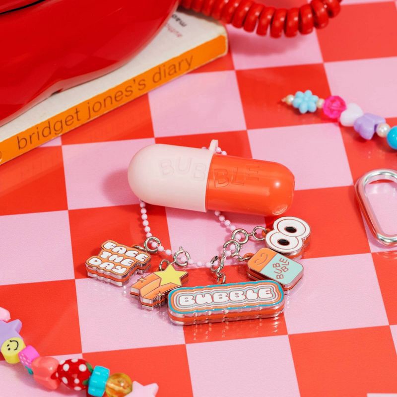 slide 2 of 5, Bubble Tell All Juicy Secret Lip Treatment, 0.15 oz