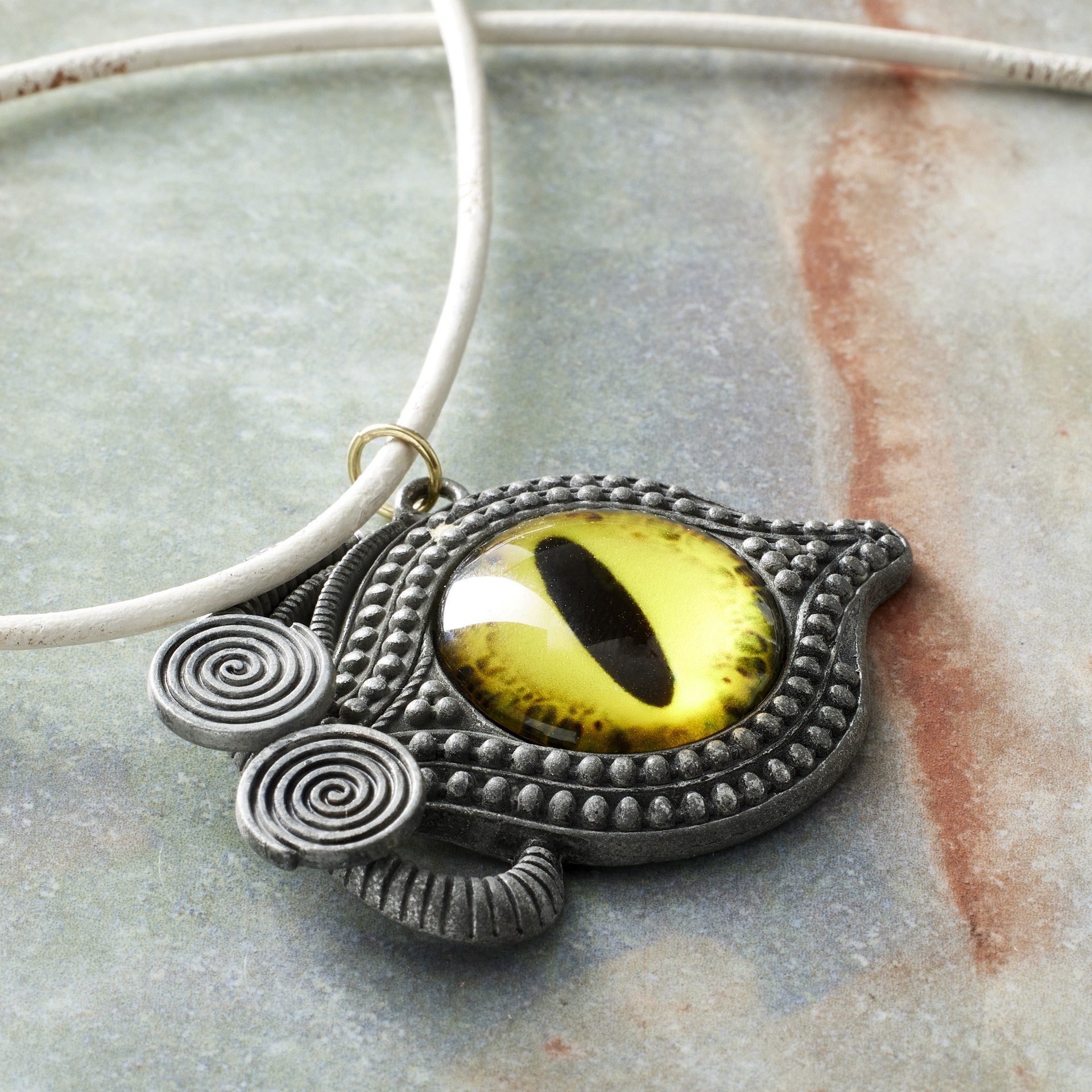 slide 2 of 3, Found Objects Yellow Eye Pendant By Bead Landing, 44mm x 30mm