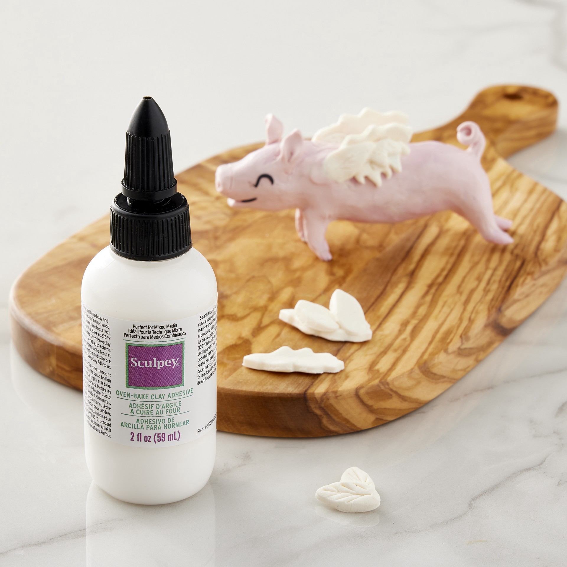 slide 2 of 3, Sculpey Bake & Bond, 2 fl oz