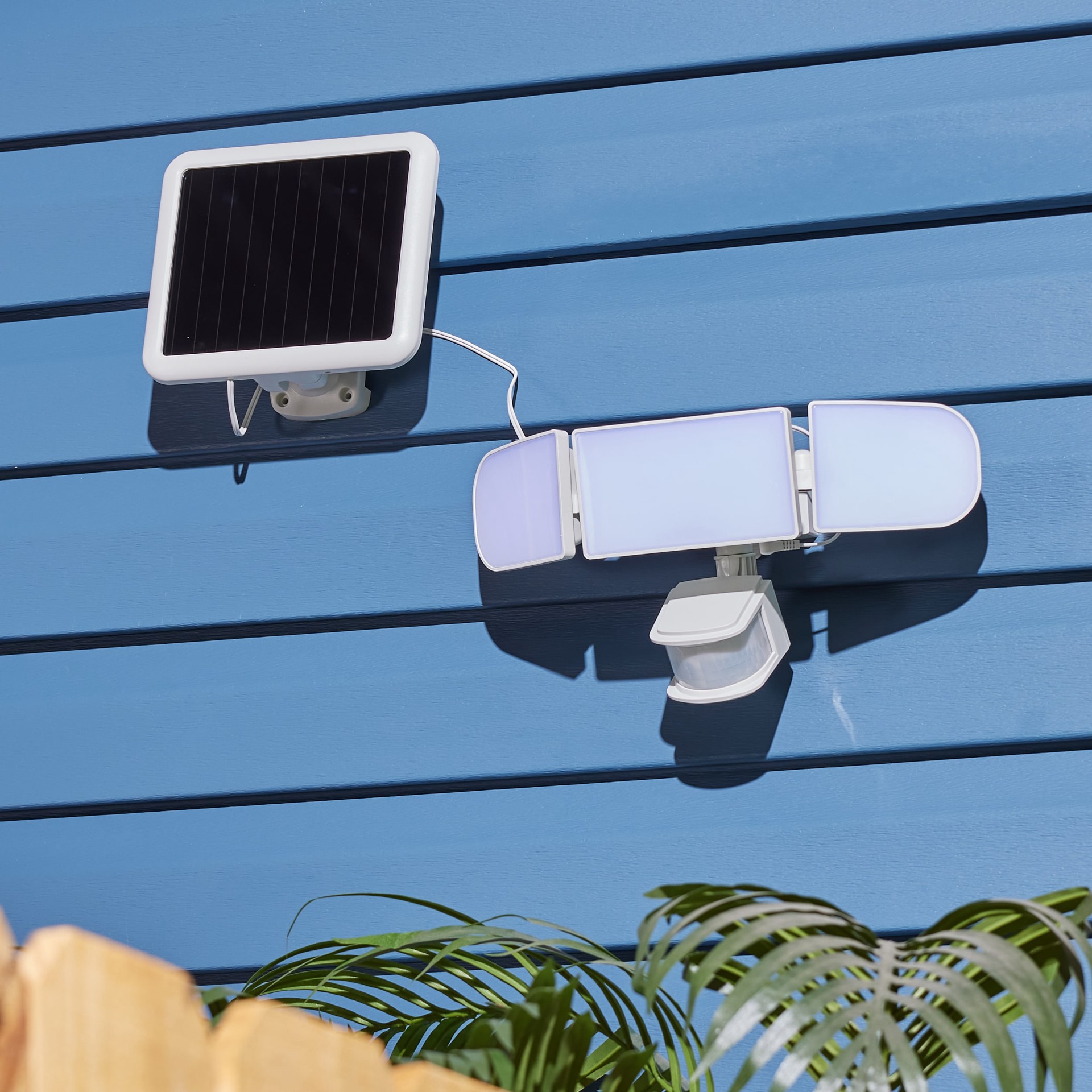 slide 6 of 6, Utilitech 240 -Degree 150 -Wattage Equivalent Solar LED White 3 -Head Motion-Activated Flood Light with Timer 2000 -Lumen, 1 ct