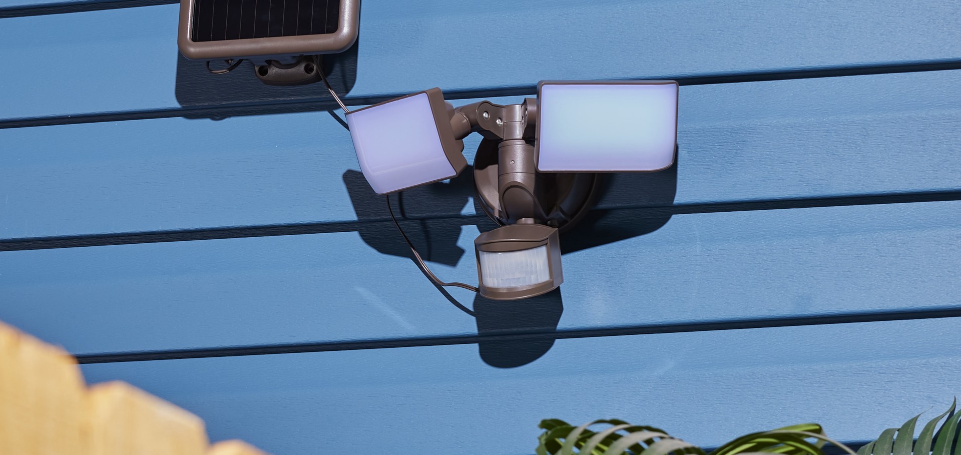 slide 3 of 6, Utilitech 180 -Degree 90 -Wattage Equivalent Solar LED Bronze 2 -Head Motion-Activated Flood Light with Timer 1200 -Lumen, 1 ct