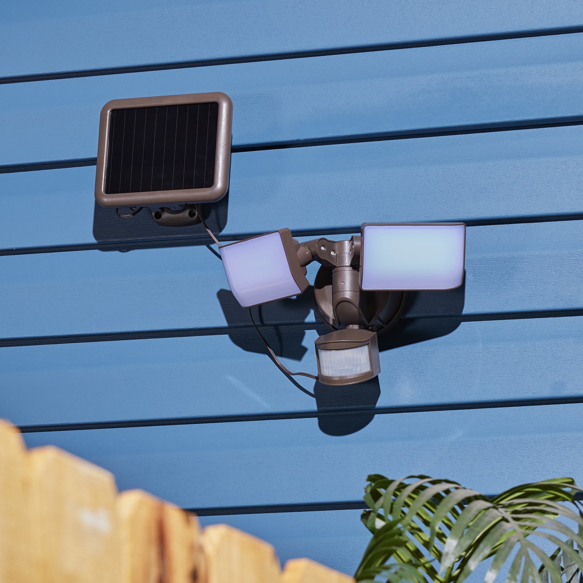 slide 5 of 6, Utilitech 180 -Degree 90 -Wattage Equivalent Solar LED Bronze 2 -Head Motion-Activated Flood Light with Timer 1200 -Lumen, 1 ct