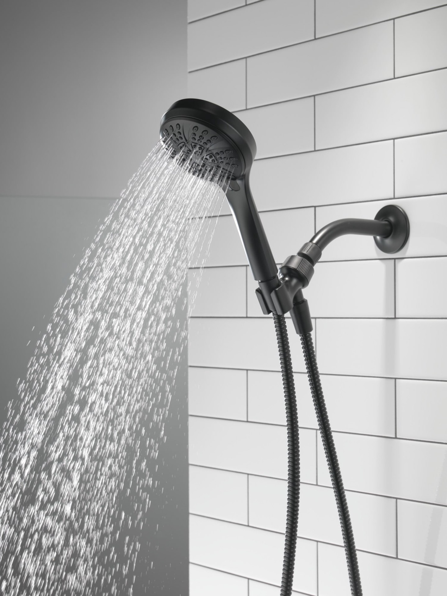 slide 2 of 6, Delta 6.0 -Spray Matte Black 4.5-in Round High Pressure Handheld Shower Head 2.5 GPM, 1 ct