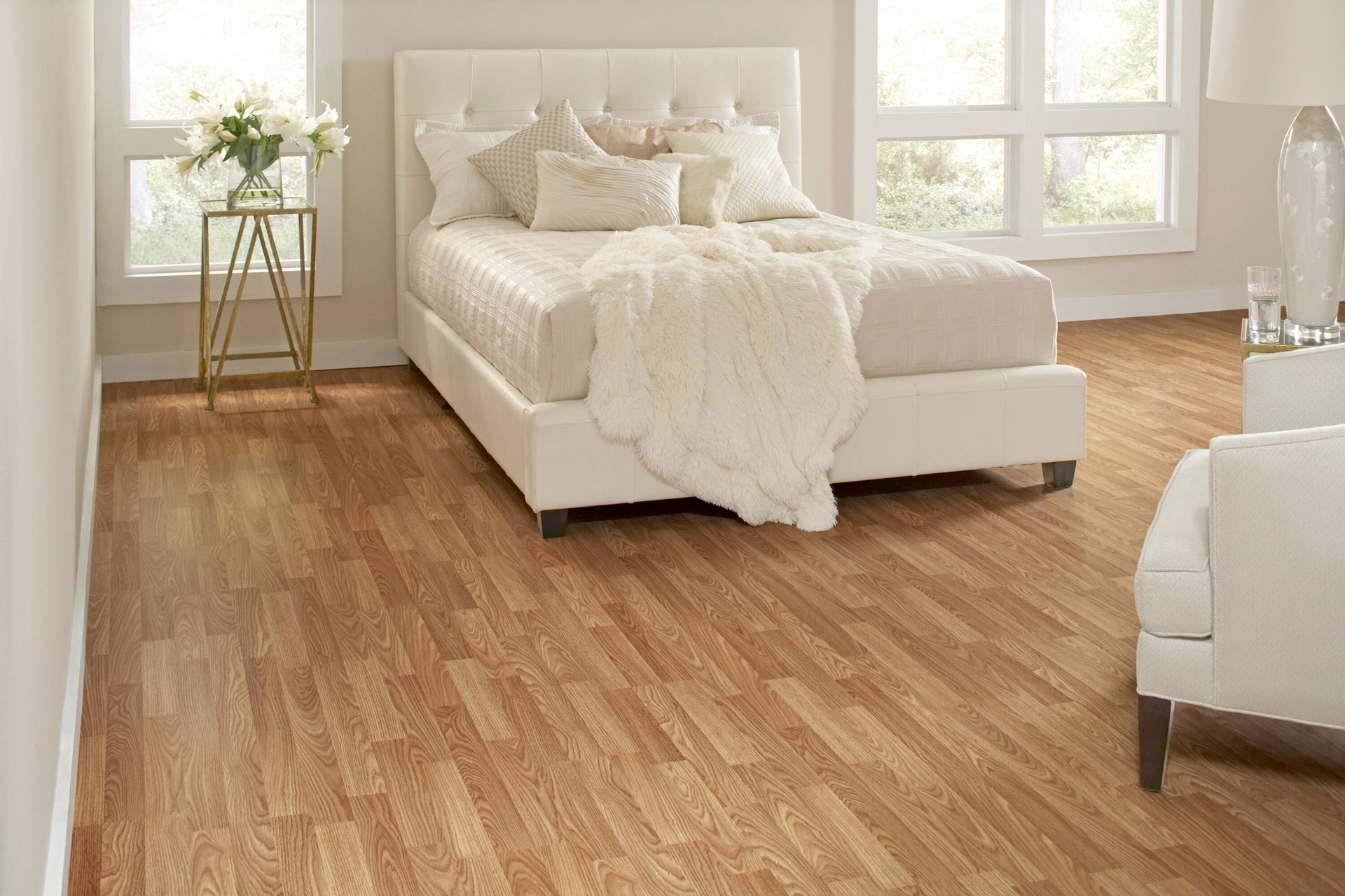 slide 4 of 6, Style Selections Warm Honey Oak 7-mm T x 8-in W x 48-in L Water Resistant Laminate Flooring ( 23.91-sq ft / Carton ), 1 ct