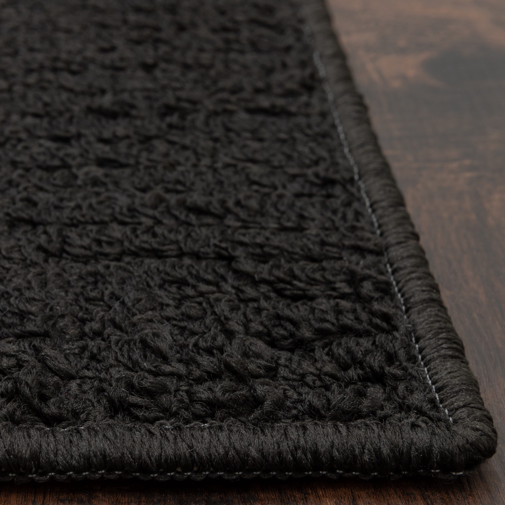 slide 5 of 6, Style Selections 2 x 3 (ft) Tufted Polyester Black Rectangular Indoor Border Machine washable Throw rug, 1 ct
