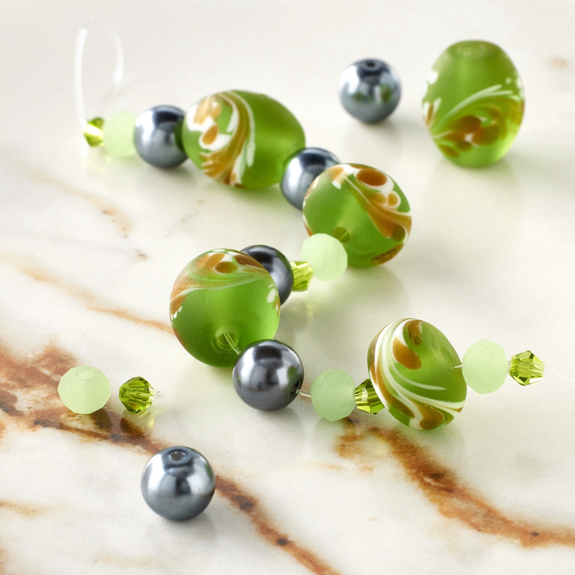 slide 3 of 3, Green Lampwork Glass Swirl Rondelle & Oval Beads By Bead Landing, 12mm-14mm