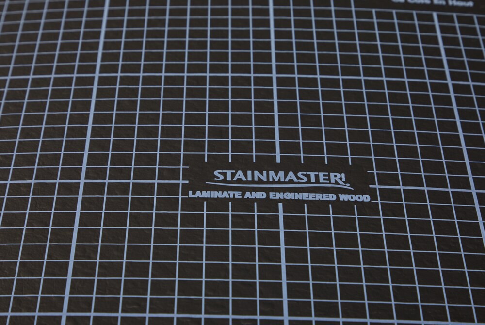 slide 3 of 6, STAINMASTER 100-sq ft 4-ft W x 25-ft L x 3 -mm T Premium Foam Moisture Resistant Flooring Underlayment For Use Under Laminate, Hardwood, 1 ct