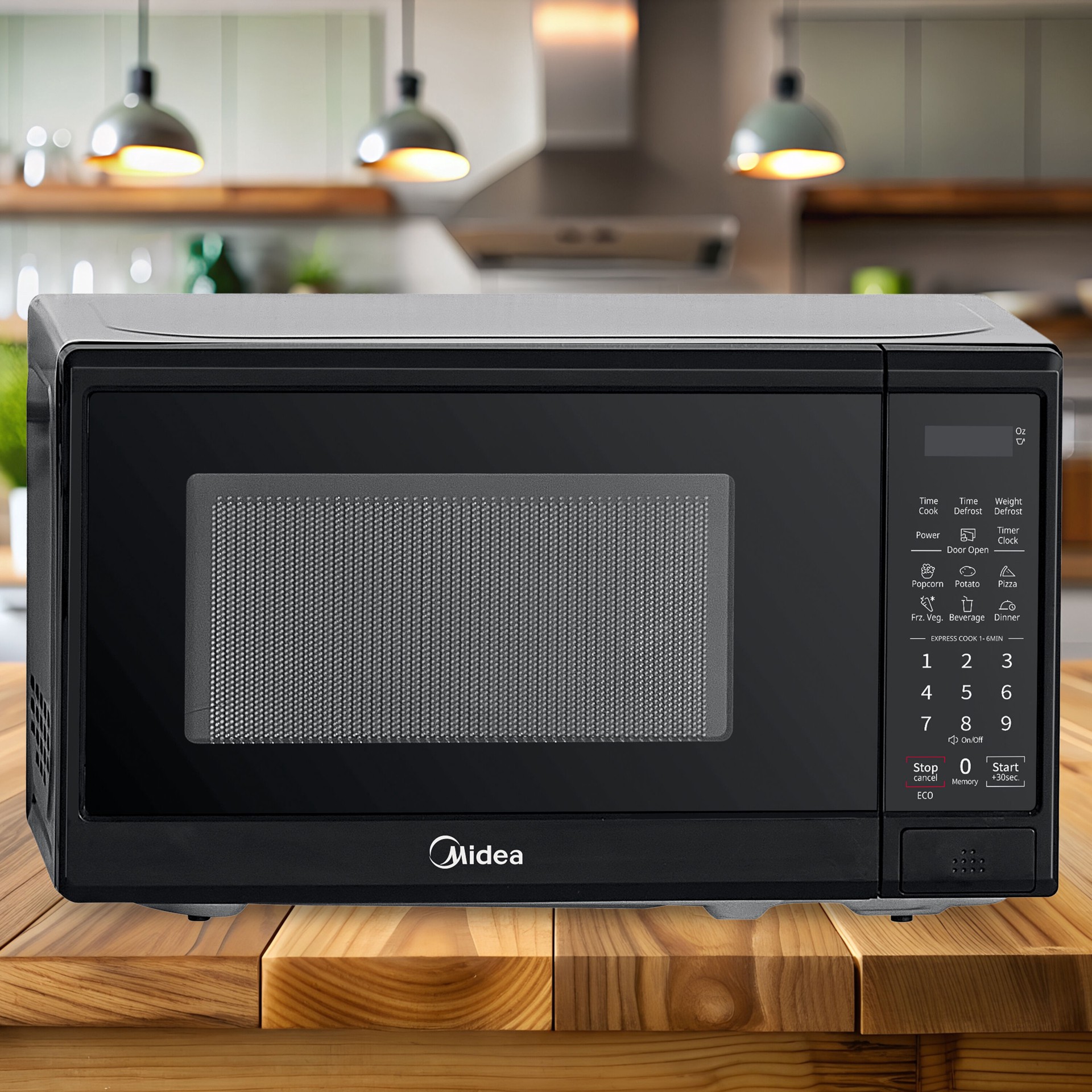 slide 5 of 6, Midea 0.7-cu ft Small 700 -Watt Countertop Microwave ( Black ), 1 ct