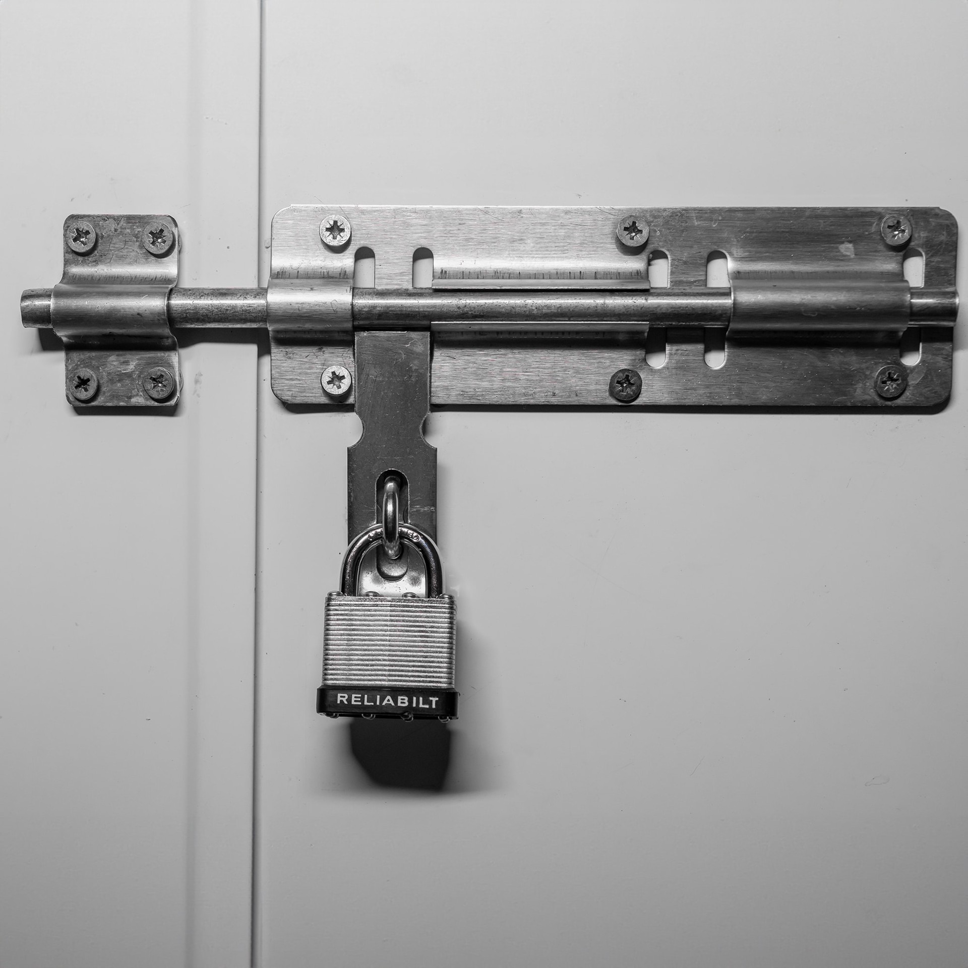 slide 4 of 6, RELIABILT Keyed Padlock, 1-9/16-in Wide x 3/4-in Shackle Keyed Different, 1 ct