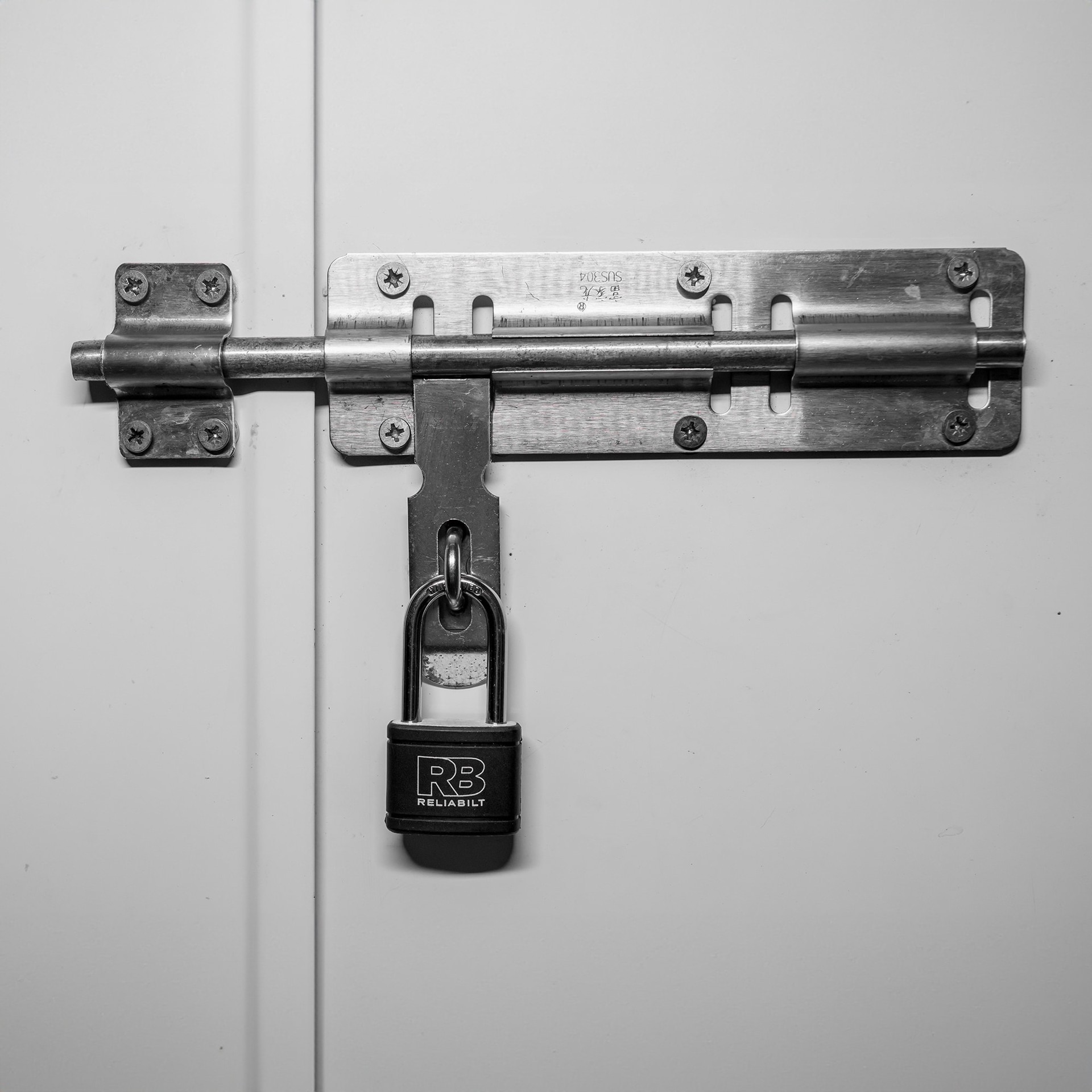 slide 4 of 6, RELIABILT Keyed Padlock, 1-5/8-in Wide x 1-1/2-in Shackle Keyed Different, 1 ct