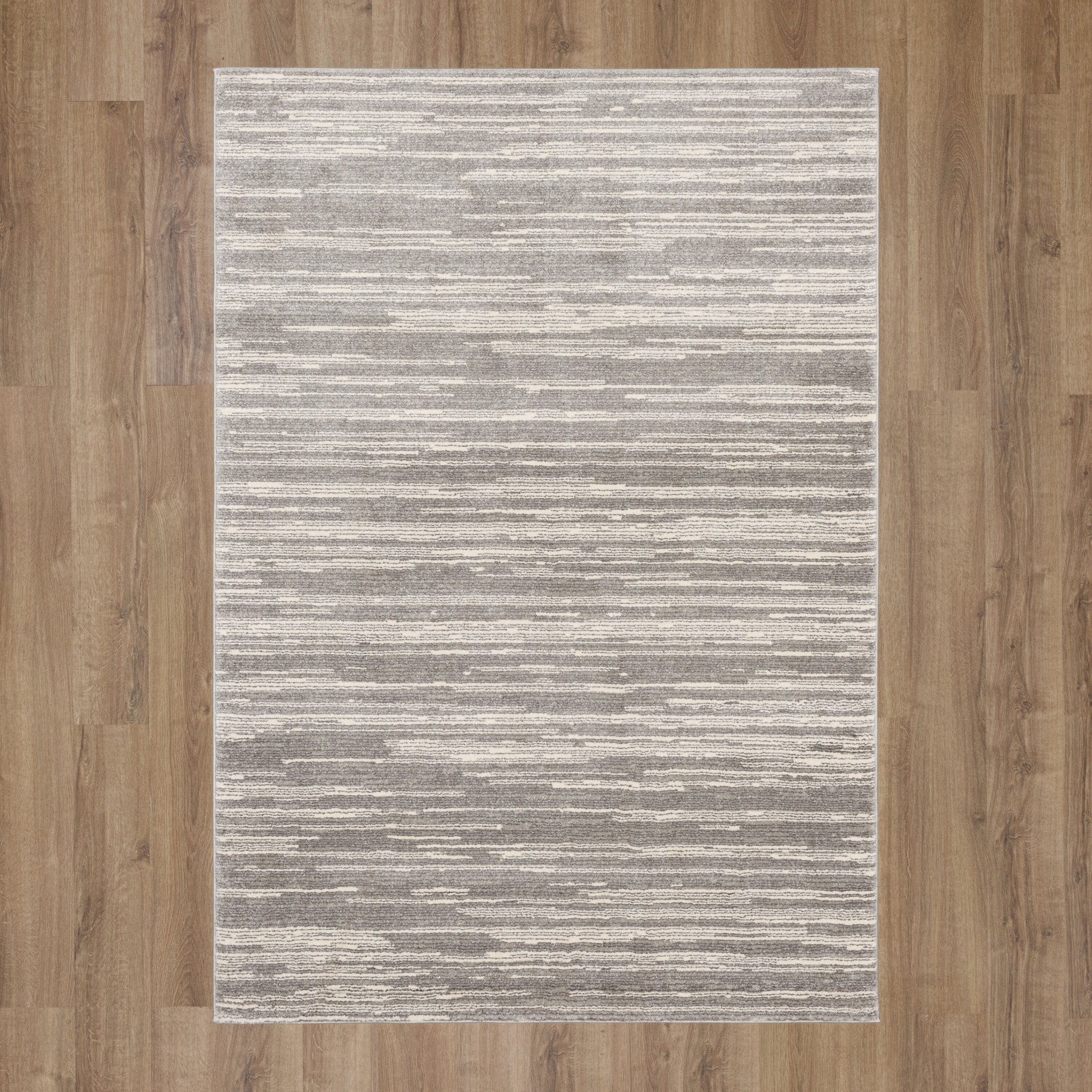 slide 3 of 6, Origin 21 Tranquil Drift 5 x 7 (ft) Loomed Polypropylene Gray Rectangular Indoor Spot Clean Only Pet Friendly Area rug, 1 ct
