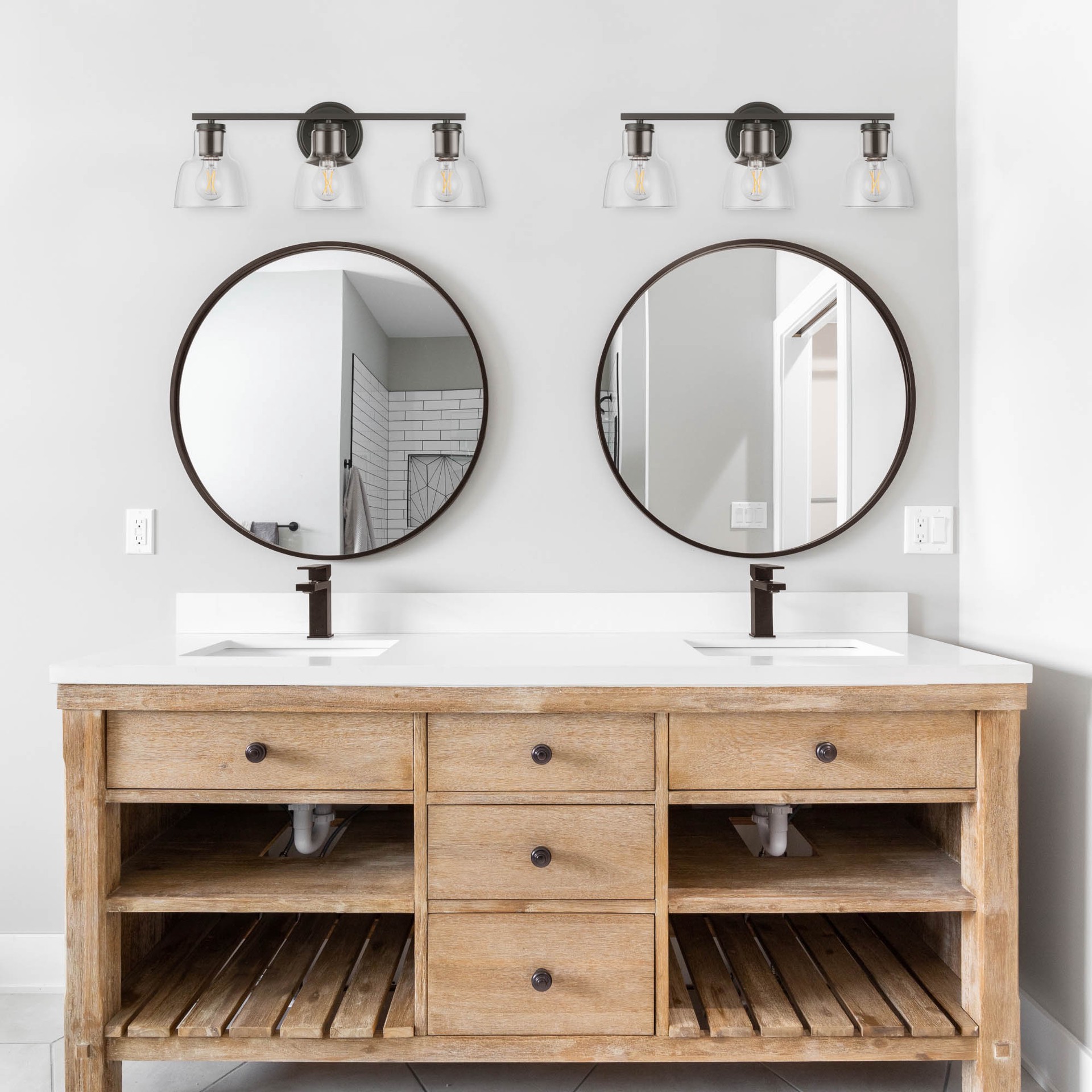 slide 6 of 6, allen + roth Irvine 23-in 3 -Light Matte Bronze Transitional Vanity light, 1 ct