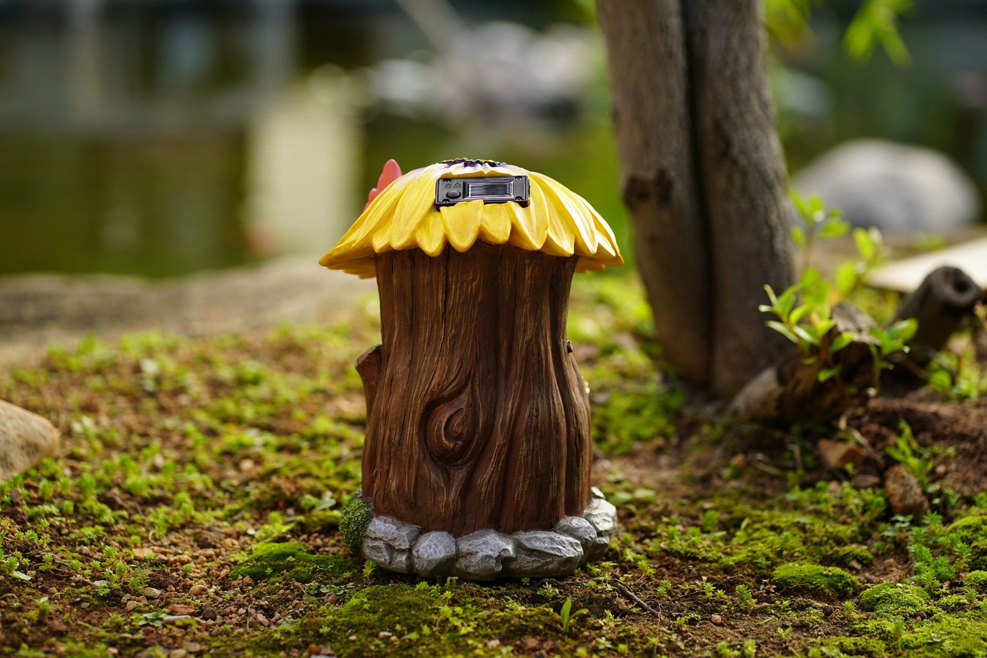 slide 4 of 6, Style Selections 10.4-in H x 7.87-in W Yellow Garden Statue, 1 ct