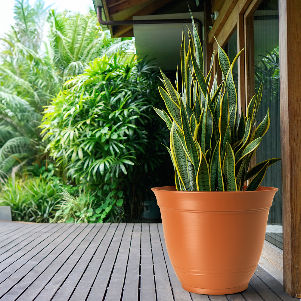 slide 4 of 6, Style Selections Round 19.21-in W x 19.21-in L Orange Recycled plastic Indoor/Outdoor Planter, 1 ct