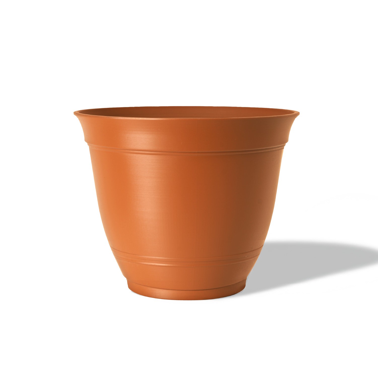 slide 1 of 4, Style Selections Round 6.02-in W x 5.12-in H Orange Recycled Plastic Indoor/Outdoor Planter, 1 ct