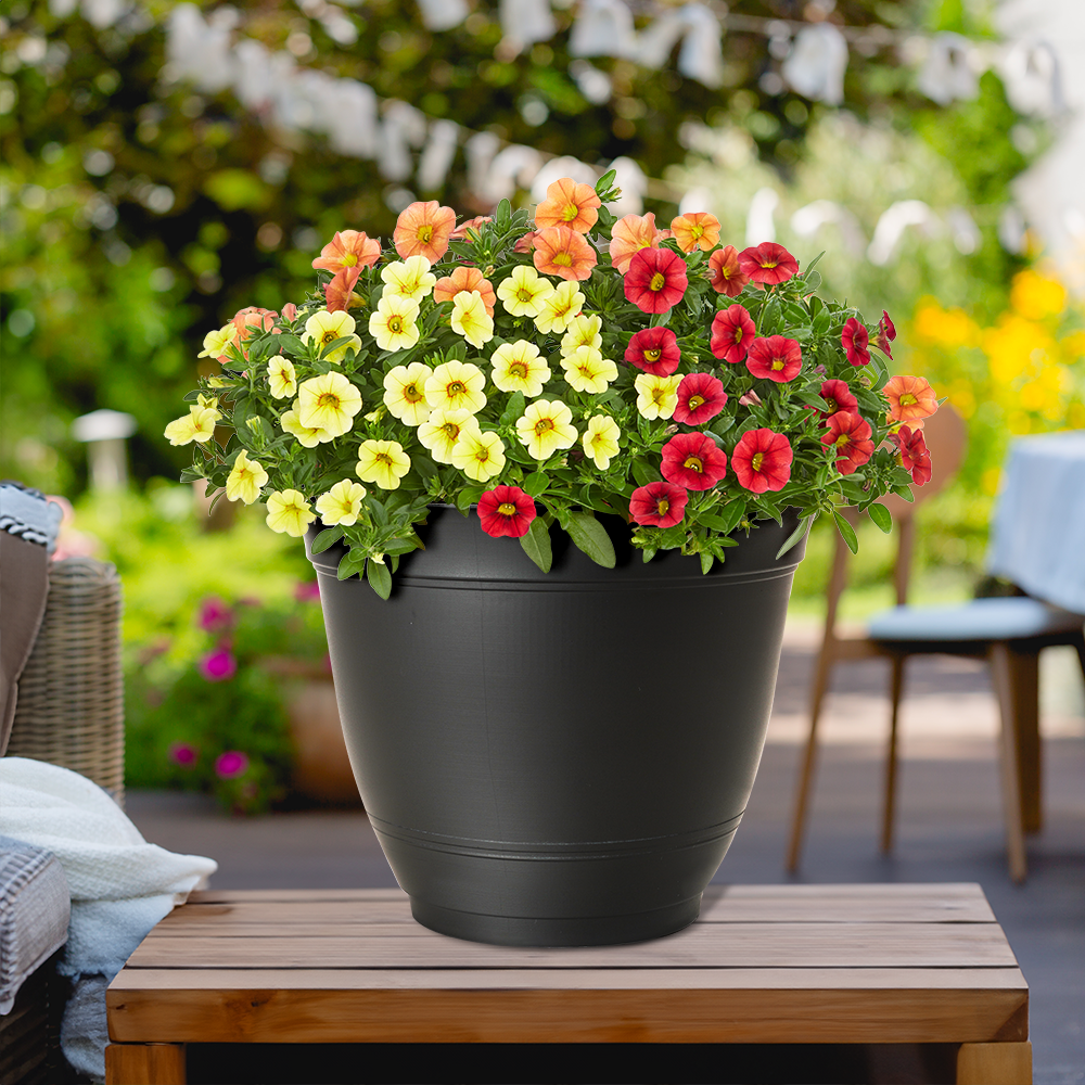 slide 2 of 4, Style Selections Round 11-in W x 9.49-in H Black Recycled Plastic Indoor/Outdoor Planter, 1 ct