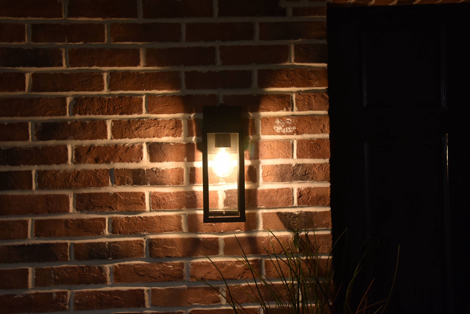 slide 6 of 6, Project Source GAVIN 1 -Light 12.4-in H Matte Black Hardwired Dusk to Dawn Outdoor Wall Light, 1 ct