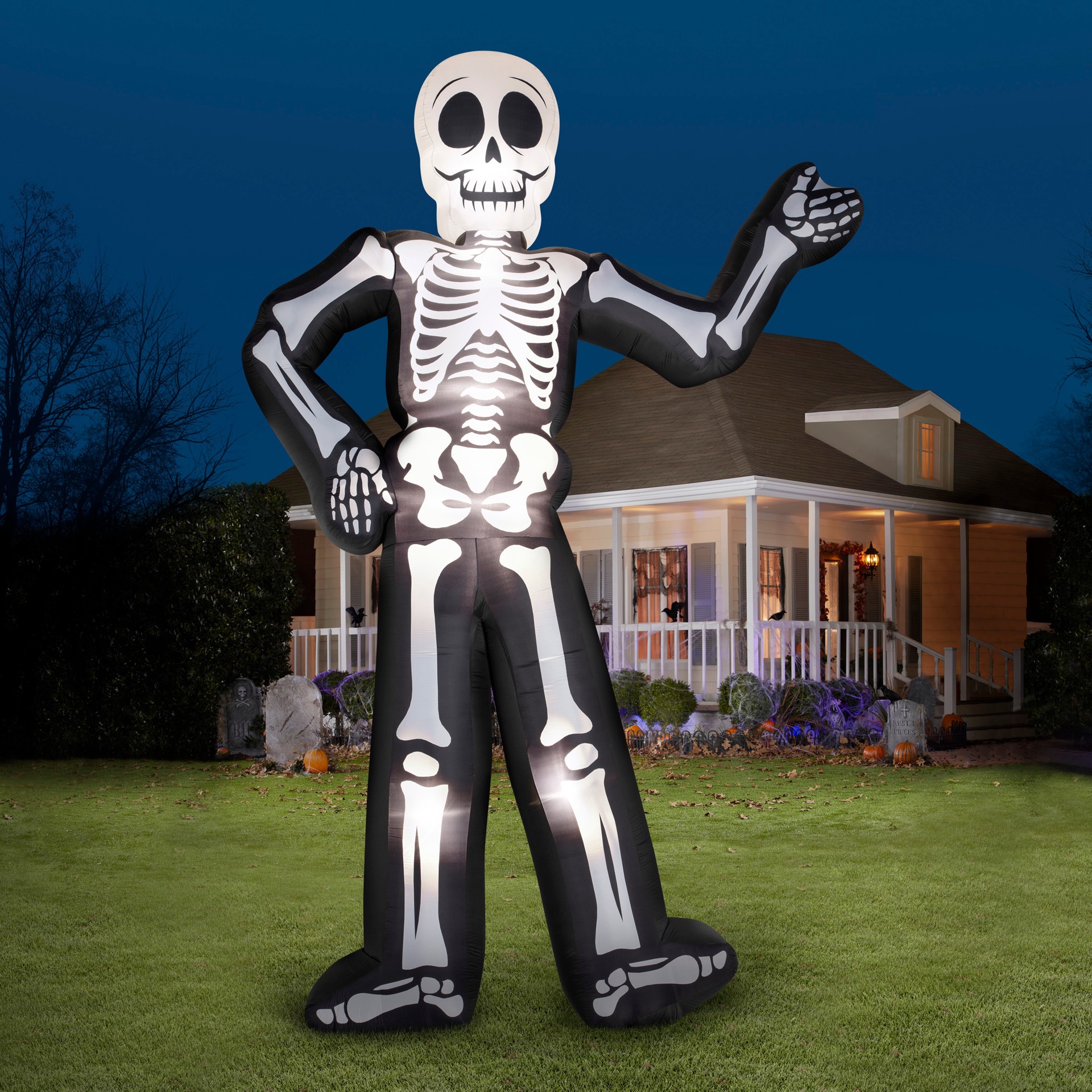 slide 6 of 6, Haunted Living 20-ft Colossal Skeleton Inflatable, 1 ct