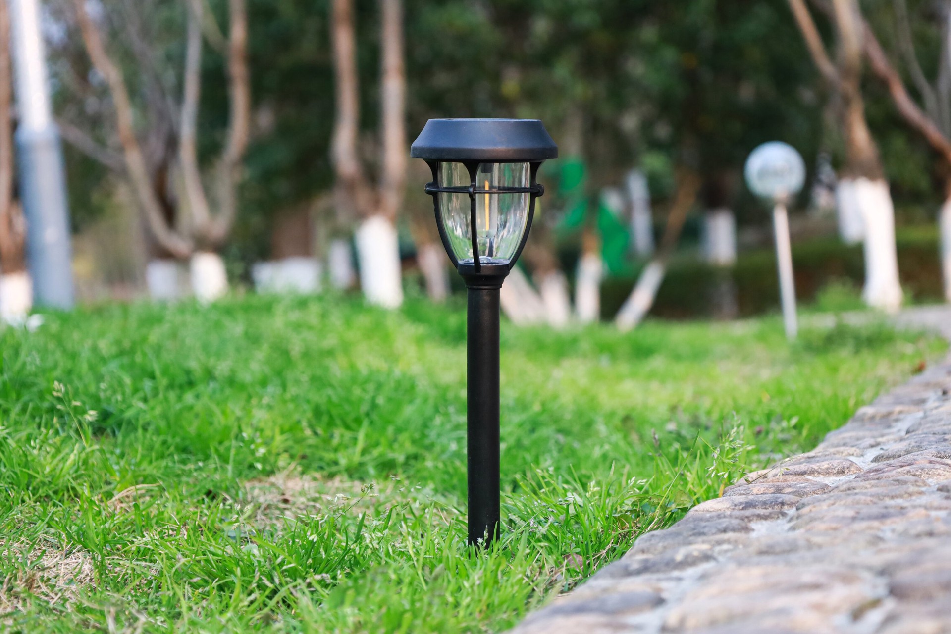 slide 3 of 6, Harbor Breeze 10 -Pack 10ct solar filament light 5 -Lumens 0.01 -Watt Black Solar LED Outdoor Path Light Kit ( 3000-K ), 1 ct