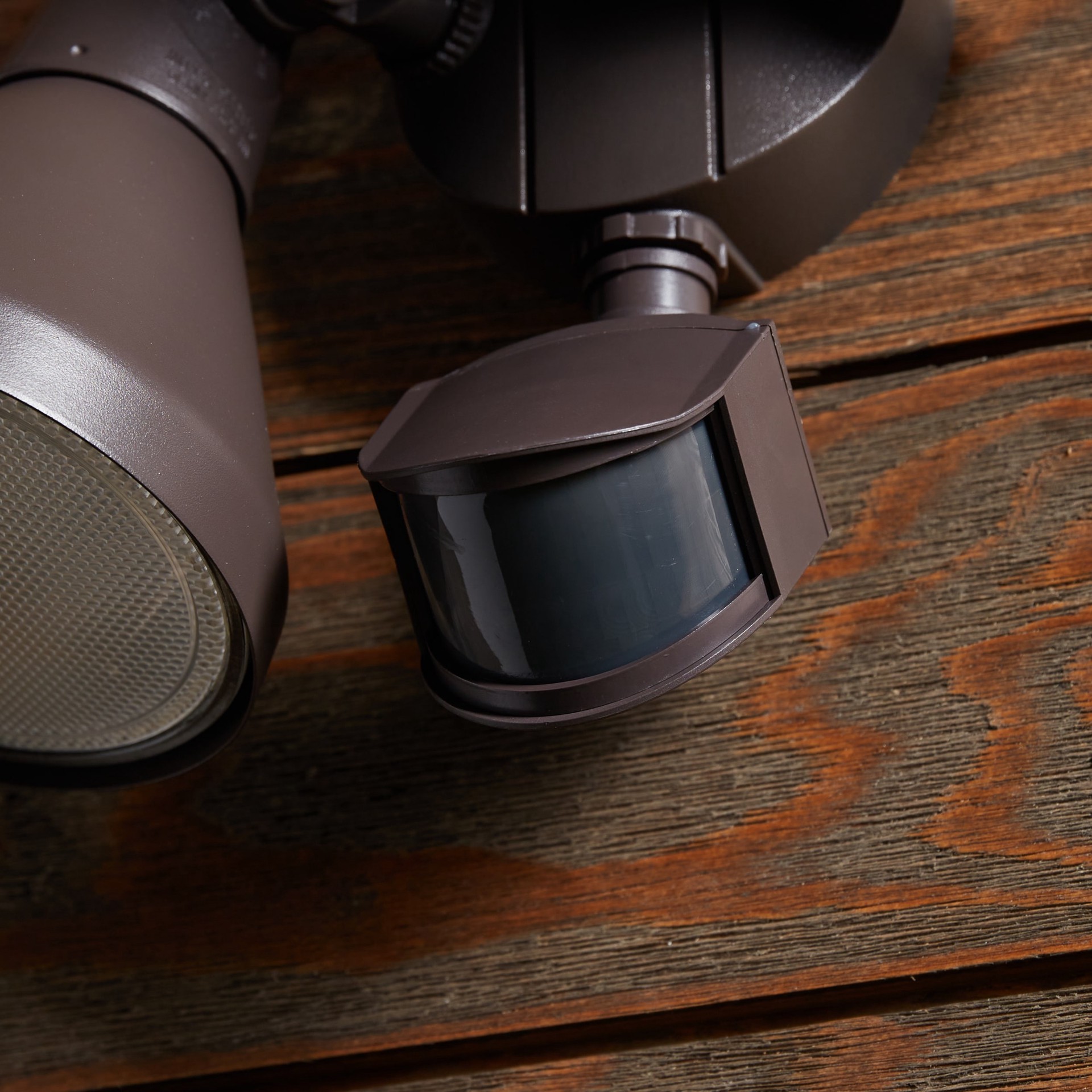 slide 6 of 6, Utilitech 180 -Degree 300 -Wattage Equivalent Hardwired Halogen Bronze 2 -Head Motion-Activated Flood Light with Timer, 1 ct