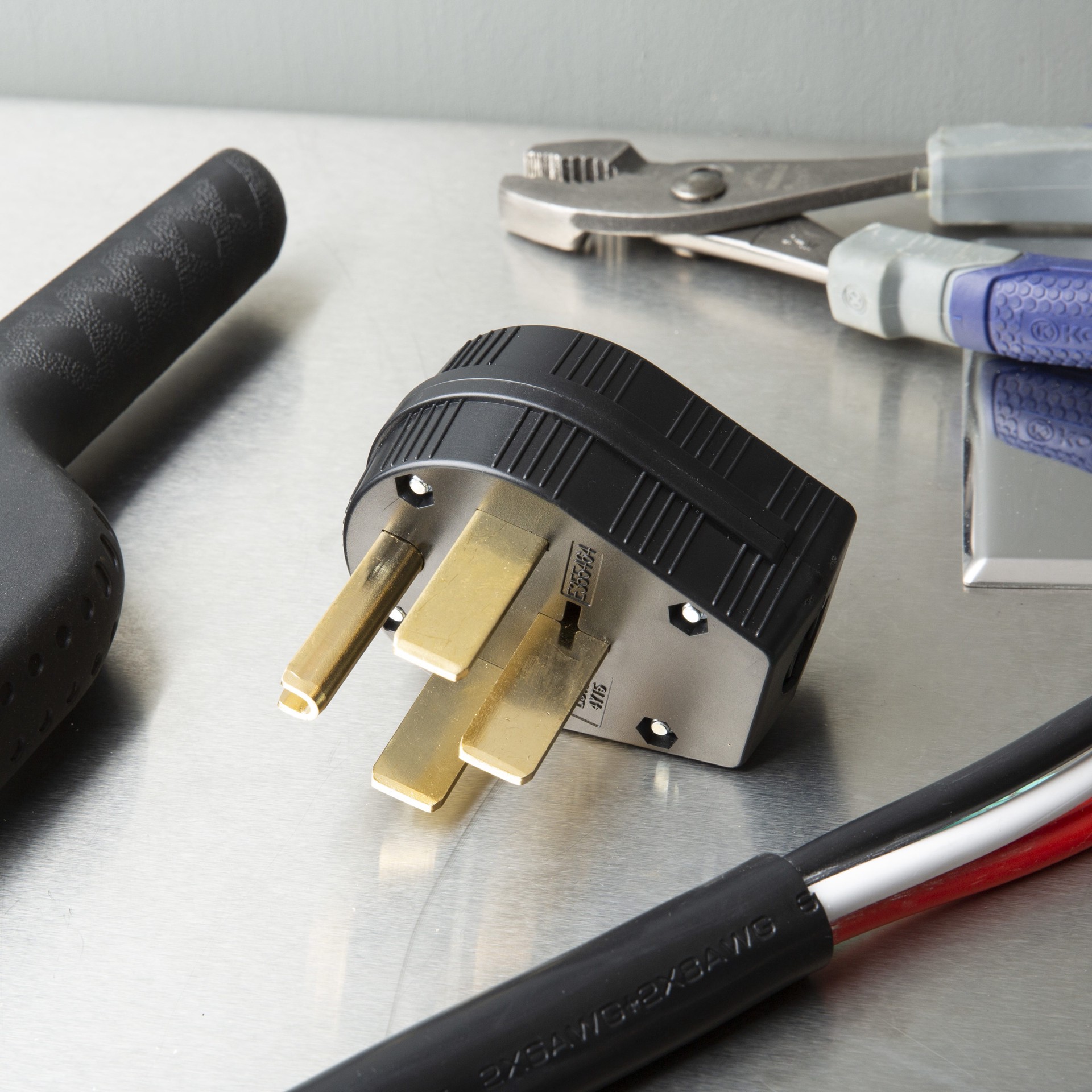 slide 2 of 2, Utilitech 50-Amp 125/250-Volt NEMA 14-50p 4-wire Grounding Heavy-duty Straight Plug, Black, 1 ct