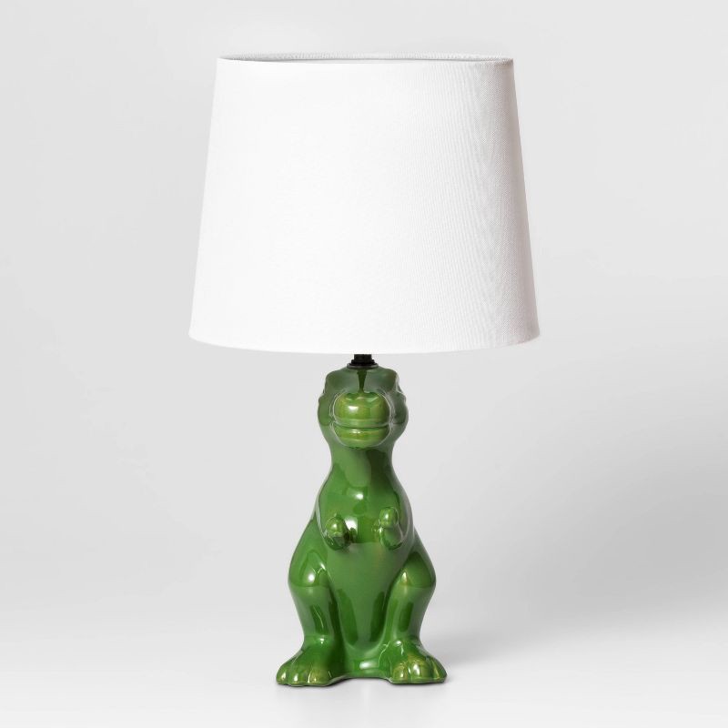 slide 3 of 5, Dinosaur Kids' Table Lamp (Light Bulbs Not Included) Green - Pillowfort™: Dino Lights for Boys, Ceramic Accent Lamp, 1 ct