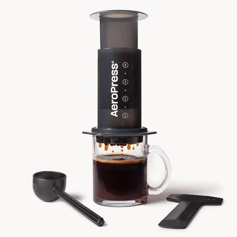 slide 2 of 6, AeroPress Original Coffee Press: Manual Single Serve Coffee Maker, 8 oz Capacity, Includes Scoop & Paper Filters, Black, 8 oz