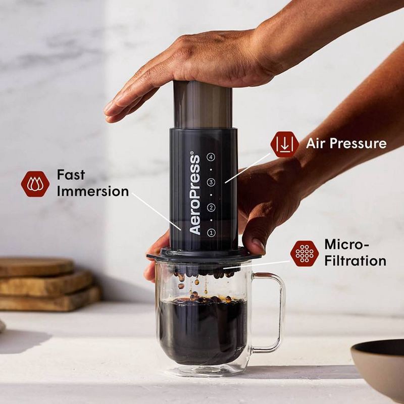 slide 3 of 6, AeroPress Original Coffee Press: Manual Single Serve Coffee Maker, 8 oz Capacity, Includes Scoop & Paper Filters, Black, 8 oz