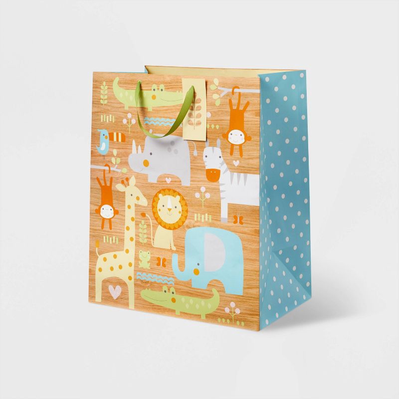 slide 1 of 3, Xlarge Animals on Woodgrain Baby Shower Gift Bag - Spritz™, 1 ct