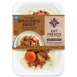 Eat Fresco Savory slow-cooked braised beef paired with creamy mashed potatoes and carrots.