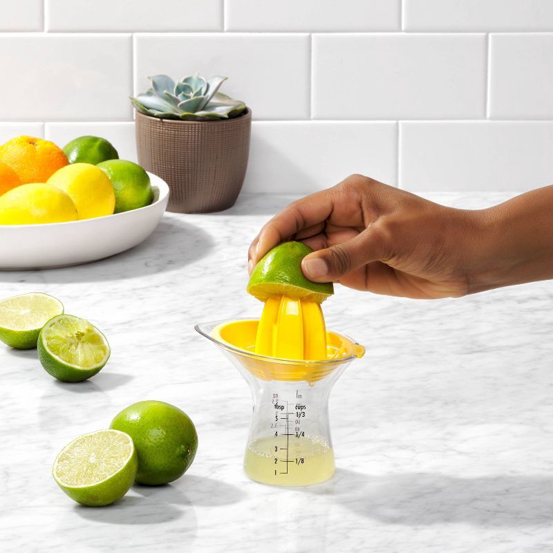 slide 6 of 9, OXO Small Citrus Reamer: Yellow Plastic Juicer, Dishwasher-Safe, 5" Height, 3.6" Width & Depth, 1 ct