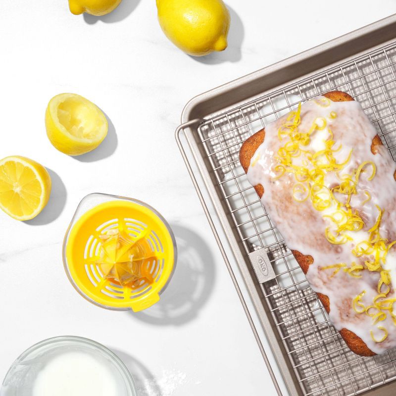 slide 8 of 9, OXO Small Citrus Reamer: Yellow Plastic Juicer, Dishwasher-Safe, 5" Height, 3.6" Width & Depth, 1 ct