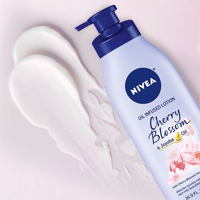 slide 2 of 8, Nivea Oil Infused Body Lotion with Cherry Blossom and Jojoba Oil - 16.9 fl oz, 16.9 fl oz