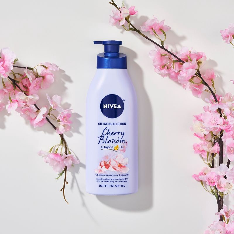 slide 4 of 8, Nivea Oil Infused Body Lotion with Cherry Blossom and Jojoba Oil - 16.9 fl oz, 16.9 fl oz