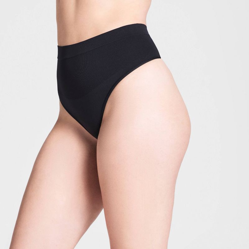 slide 3 of 3, ASSETS by SPANX Women's All Around Smoothers Thong - Black XL: Medium Control, Tummy Slimming, Light Compression, 1 ct