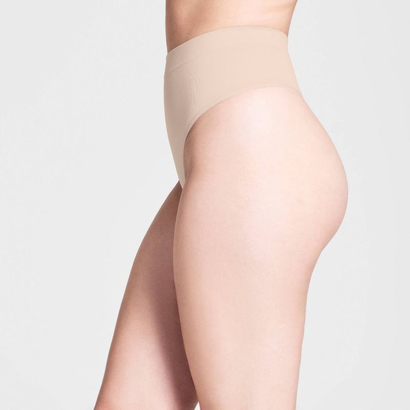 slide 3 of 3, ASSETS by SPANX Women's All Around Smoothers Thong - Beige XL: Medium Control, Tummy Slimming, Light Compression, 1 ct
