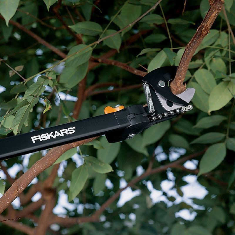 slide 2 of 5, Fiskars 5' Pruning Stik Tree Pruner: Extendable, Handheld Garden Shears, 61.75" Height, 2" Blade Width, 1 ct