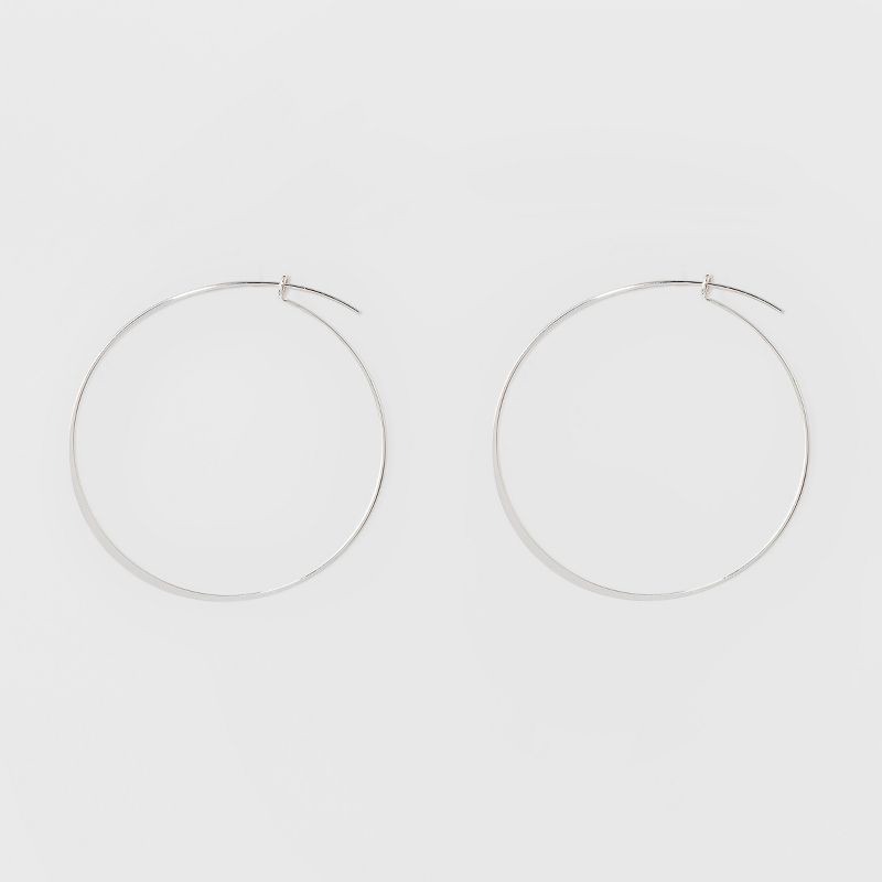 slide 1 of 4, Thin Medium Hoop Earrings - A New Day™ Silver: Brass, Nickel-Free, 2" Diameter, 1 ct