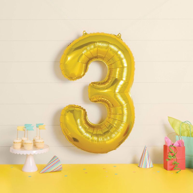 slide 2 of 4, 34" Number 3 Foil Balloon - Spritz™: Gold Birthday Decoration, Solid Pattern, All Ages, 1 ct
