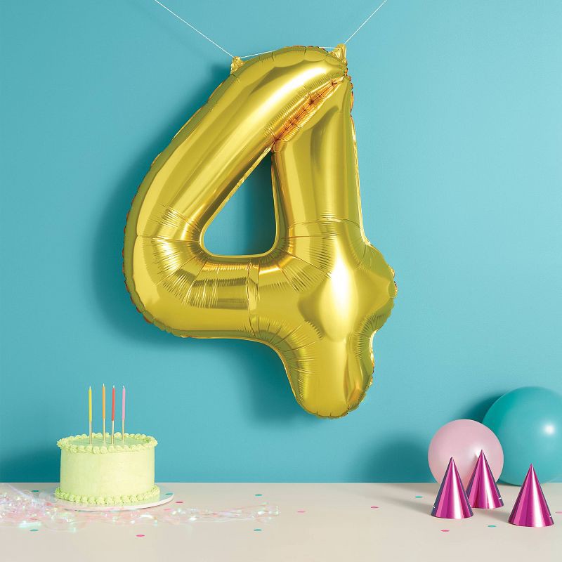 slide 2 of 4, 34" Number 4 Foil Balloon - Spritz™: Gold Birthday Decoration, Solid Pattern, All Ages, 1 ct