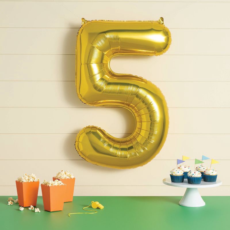 slide 2 of 4, 34" Number 5 Foil Balloon - Spritz™: Gold Birthday Decoration, Solid Pattern, All Ages, 1 ct